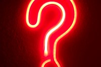red neon sign question mark